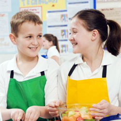 boy and girl smiling at each other