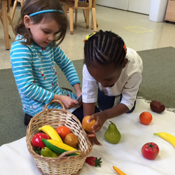 girls with fruit