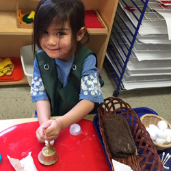 girl with cleaning supplies